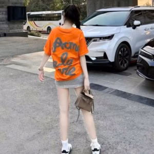 Set Váy Nữ Gồm Áo Thun In Nổi Chữ Acne Và Chân Váy Da Cá Có Quần Bảo Hộ Tp66 - Golden Dream